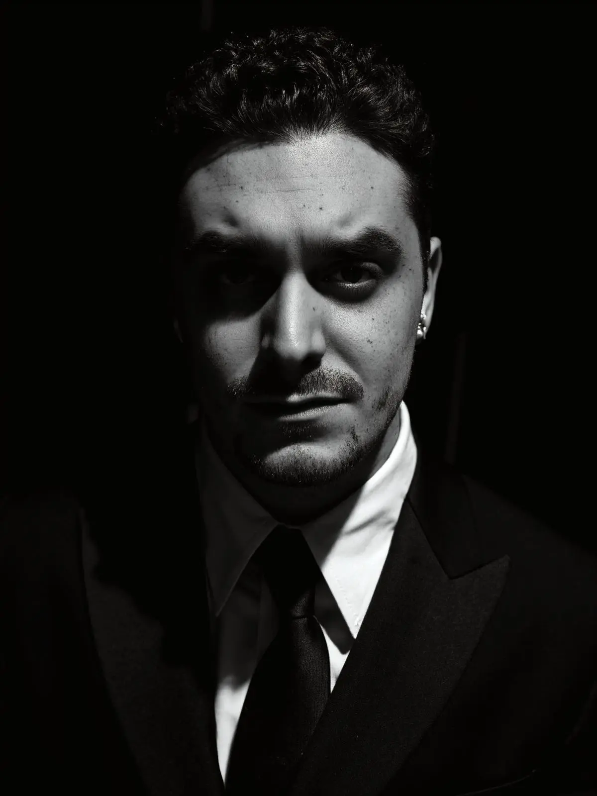 Mikhail Farcossà in front of his Steinway piano